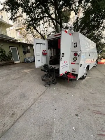 Magnet Plumbing service vehicle on-site for Grease Trap Cleaning in Parkland